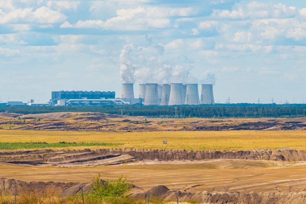 pexels-photo-9223158 Landscape view of coal power plant emitting steam with industrial towers in Munich, Germany.